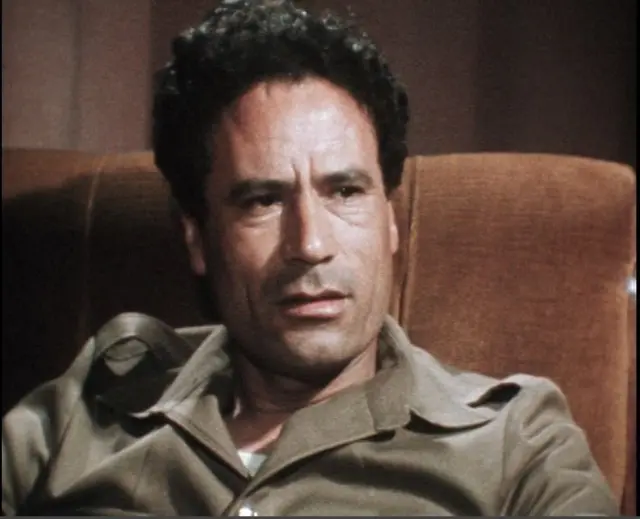 Муаммар Каддафи