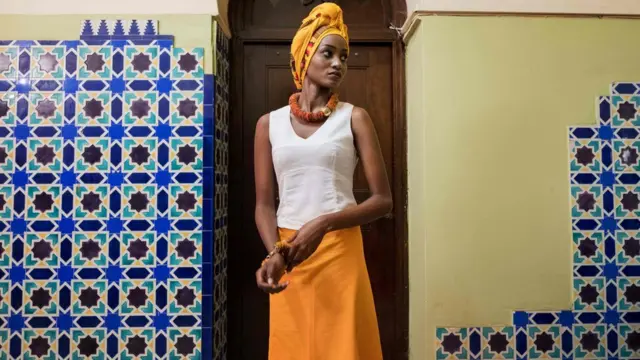A model waits to go on stage during the opening night of the Swahili Fashion Week being held at the National Museum in Dar es Salaam, Tanzania on December 2, 2016.