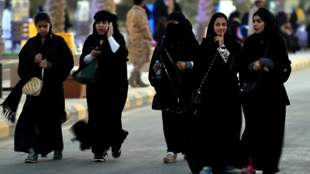 Saudi women arrive to attend the Janadriyah festival of Heritage and Culture held in the Saudi village of Al-Thamama