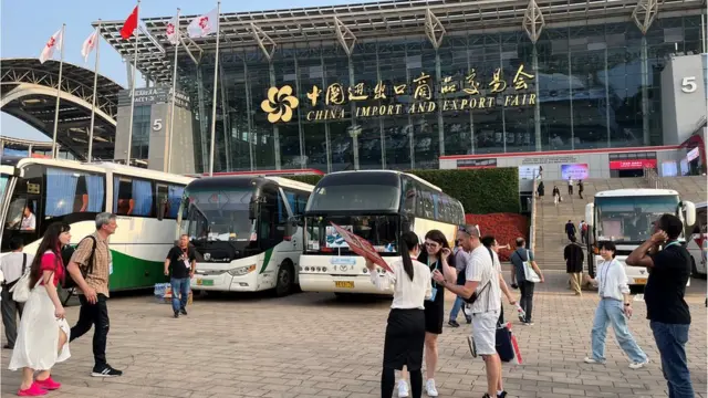 Visitors walk outside the venue of the China Import and Export Fair, also known as Canton Fair, in Guangzhou, Guangdong province, China April 16, 2023