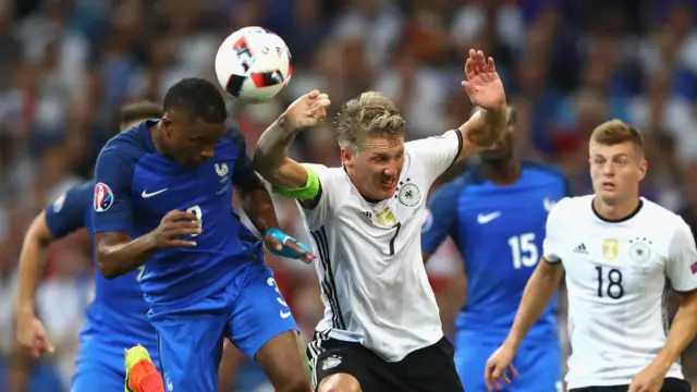 Evra y Schweinsteiger