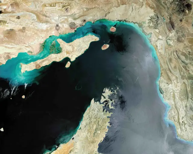 Satellite image on 24 May 2017 of the Strait of Hormuz, a strategic maritime choke point, with Iran situated at the top and Qeshm Island and the United Arab Emirates to the South