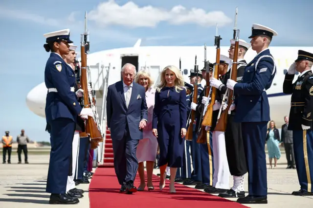 Britain's King Charles III and Queen Camilla are greeted by US Protocol Chief Monica Crowley as they arrive at Joint Base Andrews, Maryland, on April 27, 2026.