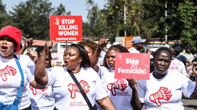  Nakuru human rights activists march in the streets while chanting slogans to demonstrate against rising cases of violence against women during this year's International Human Rights Day