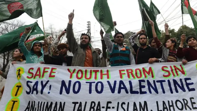 Pakistan youth shout slogans against Valentine Day inside Lahore on February 14, 2013.