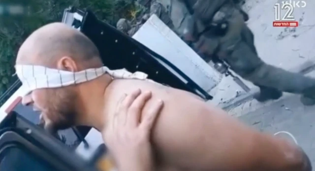 قائد مجموعة مقاتلين من القسام بعد تسليم نفسه إلى الجيش