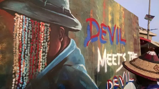 Wani zanen Anas da aka yi a bango domin gargadi ga masu aikata rashawa