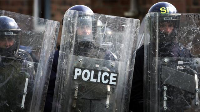 UK police with shields