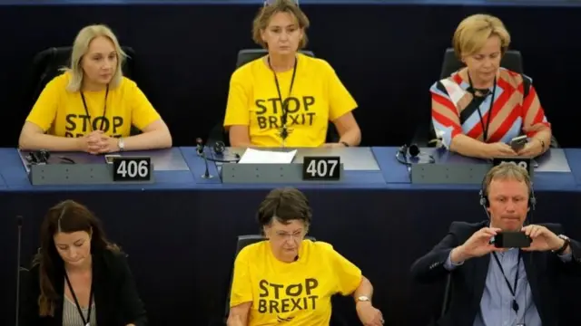 Liberal Democrat MEPs wearing "Stop Brexit" T-shirts