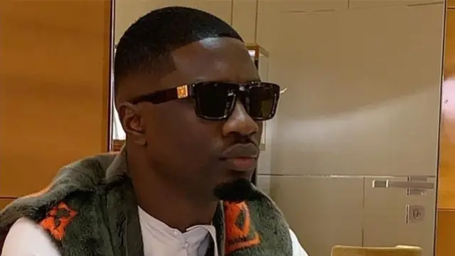 Olalekan Jacob Ponle wey pipo also know as Woodberry one of di internet fraudster Dubai police arrest