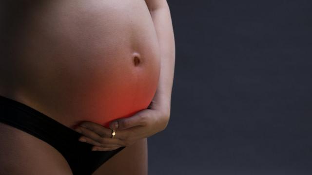 Barrigajogo de apostar dinheiro futebolmulher grávida