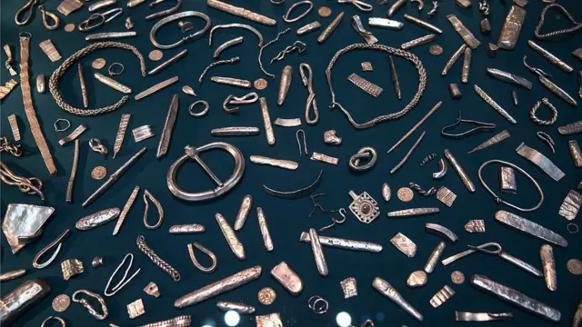 Museum display of some of the treasures displayed with the Sutton Hoo finds at The British Museum in London