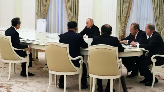 পুতিন ওয়াং ই বৈঠক 