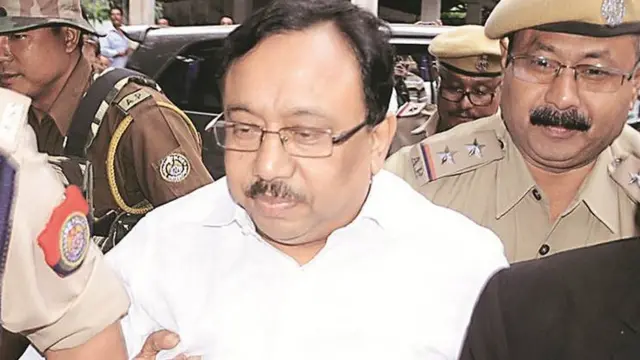 एपीएससी घोटाले में तब के अध्यक्ष राकेश पॉल गिरफ़्तार किए गए थे