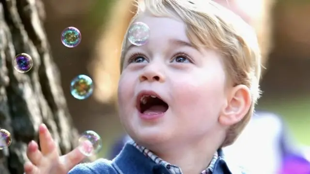 29 September 2016: Prince George playing with bubbles at a party for military families in Canada.