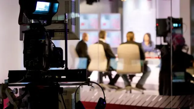 ਕਿਸੇ ਨੀਊਜ਼ਰੂਮ ਦੀ ਧੁੰਦਲੀ ਤਸਵੀਰ