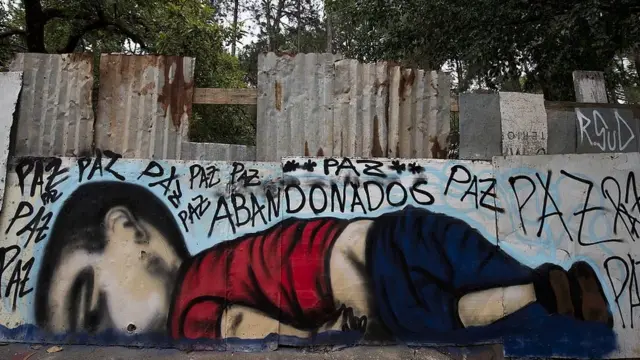 Grafiti de Aylan en una pared.