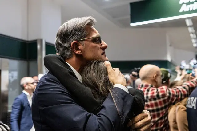 MILAN, ITALY - MARCH 3: Students from across Italy, who were stranded in Dubai due to the US-Israeli attack on Iran that prompted Tehran's subsequent military response, reunite with their families at Milan Malpensa Airport in Milan, Italy, on March 3, 2026. (Photo by Andrea Carrubba/Anadolu via Getty Images)