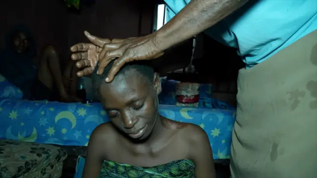 Woman wey dey massage