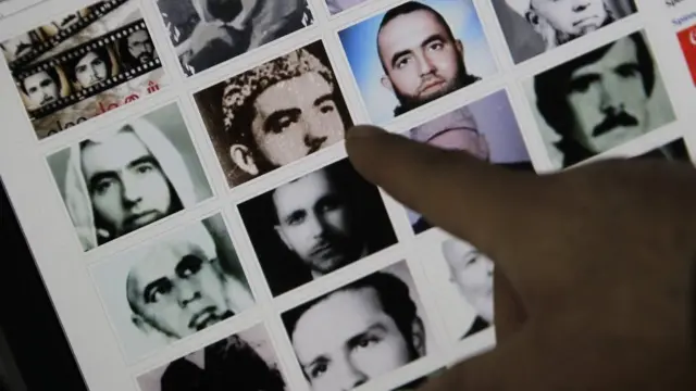 हामा में मारे गए लोगों की तस्वीरें