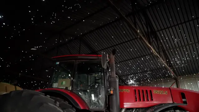 Обстріляний ангар із технікою на підприємстві Надії Стоянової