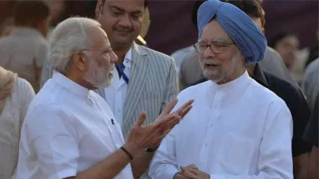 नरेंद्र मोदी, मनमोहन सिंग
