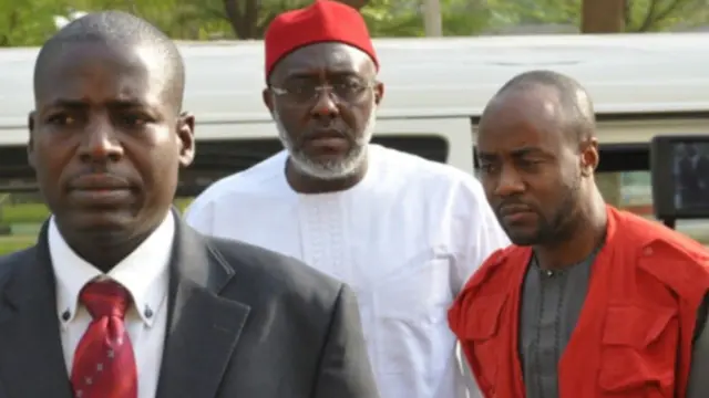 Olisa Metuh with EFCC operatives