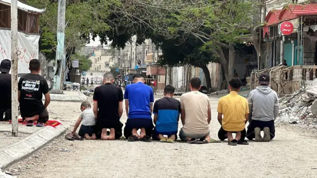 In Gaza's Rafah, where Israeli attacks continue, Palestinians perform the Friday prayer amidst the rubble of the mosques destroyed in the attacks on May 10, 2024. 