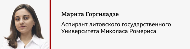 Портрет девушка с темно-русыми волосами, в белой рубашке со сложенными на груди руками.