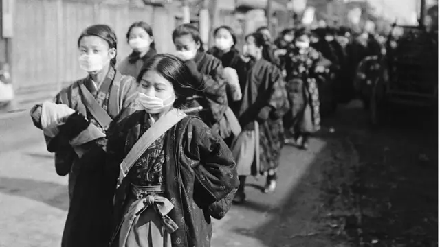 Tapabocas en Japón.-