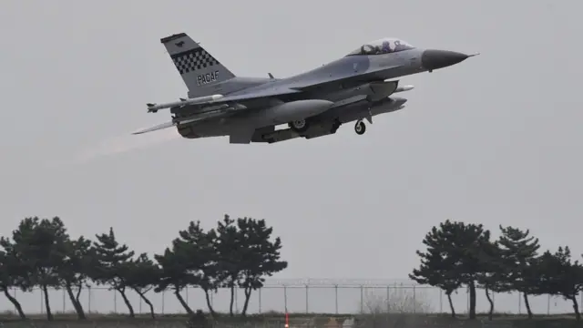 A South Korean F-15K jet fighter takes off during the 'Max Thunder' South Korea-US military joint air exercise at a US air base in the southwestern port city of Gunsan