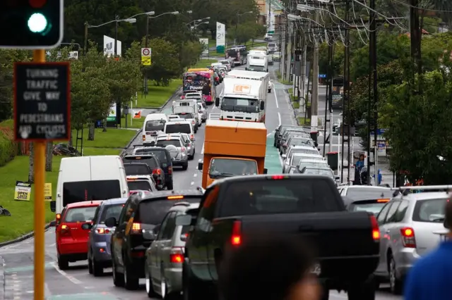 People leave the city early congesting roads before Cyclone Cook is due to reach landfall on 13 April 2017 in Auckland, New Zealand.
