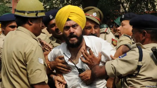 Relatives of Indian Sikhs killed in rioting in October 1984