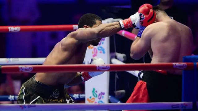 Anthony Joshua punching Kristian Prenga