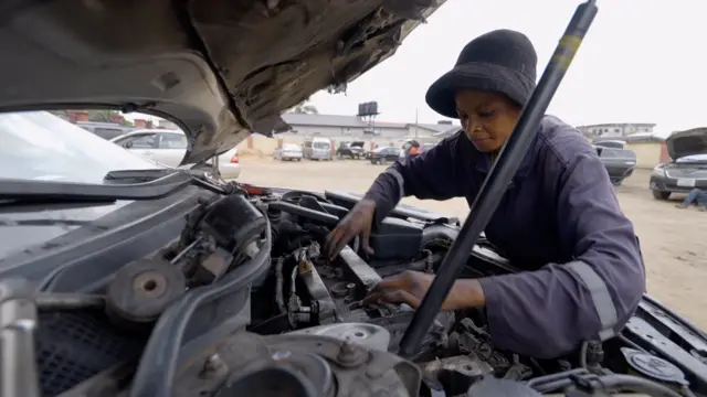 Joy Stephen Justin dey work on motor engine