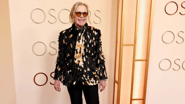 Емі Медіган,