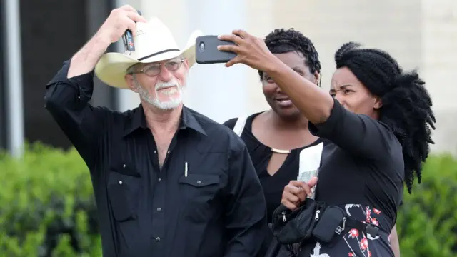Congregant leave Life Tabernacle Church after Easter service