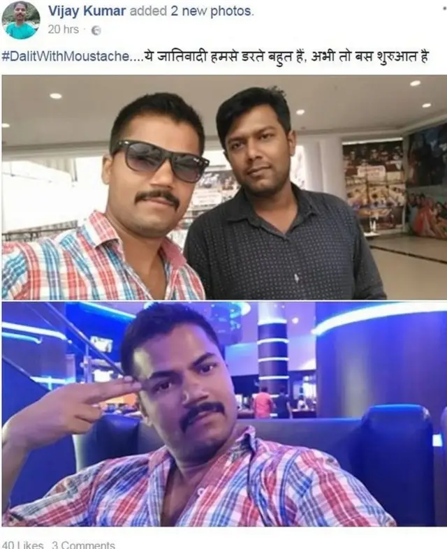 લમણા પર હાથની બે આંગળીથી બનાવેલી બંદૂક સાથે પોઝ આપતો યુવક