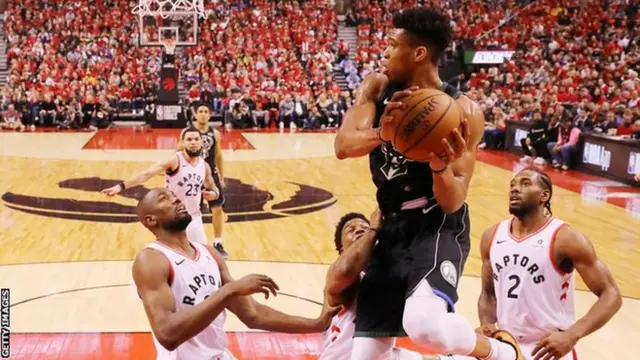 Giannis Antetokounmpo in action for Bucks v Raptors