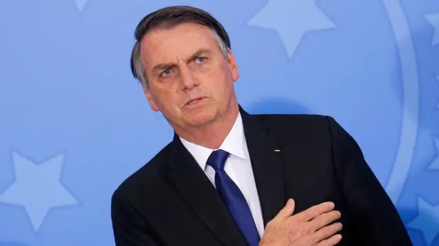 Le président brésilien Jair Bolsonaro lors de la cérémonie de signature d'un décret assouplissant les lois sur les armes à feu