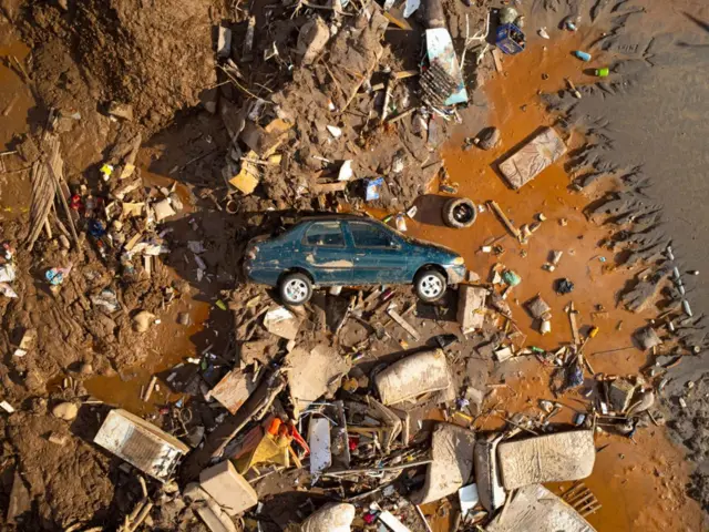 Aerial view of cars and rubble after the Rio das Velhas overflowed on 12 January 2022 in Honorio Bicalho, Brazil. 