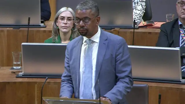 Vaughan Gething speaking in the Senedd debate