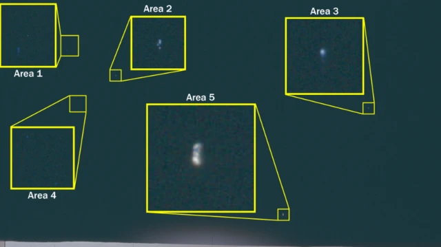 A black sky with little white dots that are highlighted inside yellow boxes