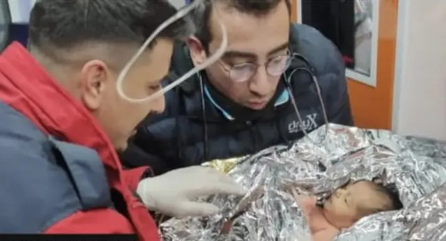 Rescuers within Baby Yagiz