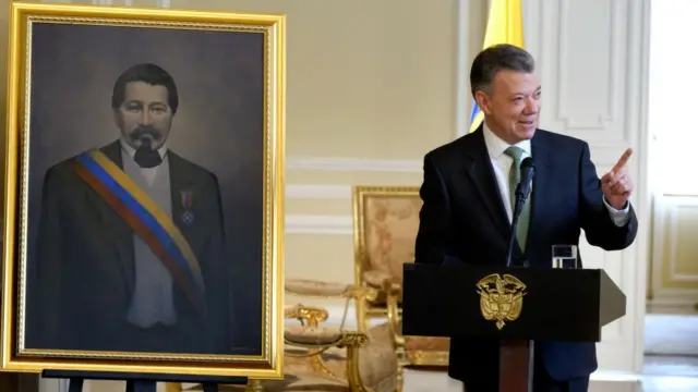 Santos con el cuadro de Nieto