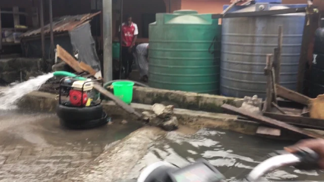 Pumping machine wey dey comot water from compound