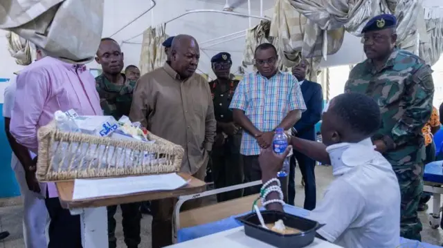 Some of the victims who are out of danger engage with president Mahama