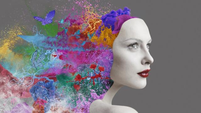 Imagen computacional de mujer y cabeza con colores.