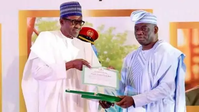 Abiola son, Kola receive di post humous GCFR award from former late President Muhammadu Buhari