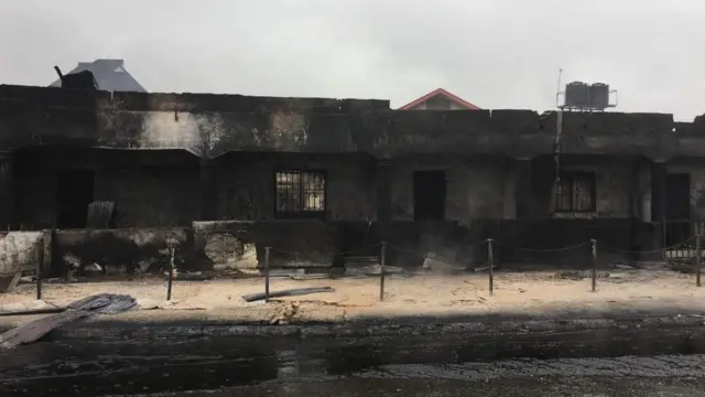 Front of di church wey burn.